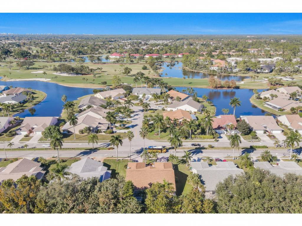 470 St Andrews Boulevard Naples, FL 34113 - Photo 1 of 32 a view of a city with an ocean