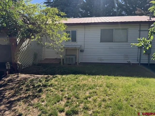 a view of a refrigerator and storage