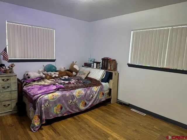 a view of backyard with cabin