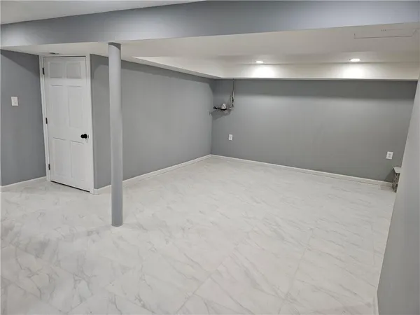 a utility room with a sink washer and dryer