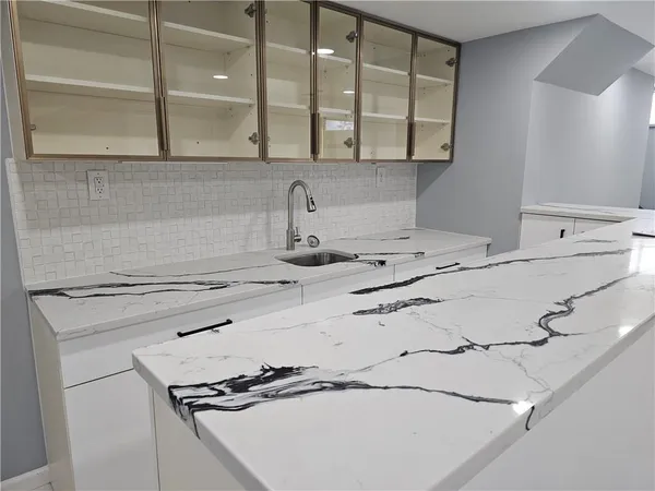 an empty room with wooden door