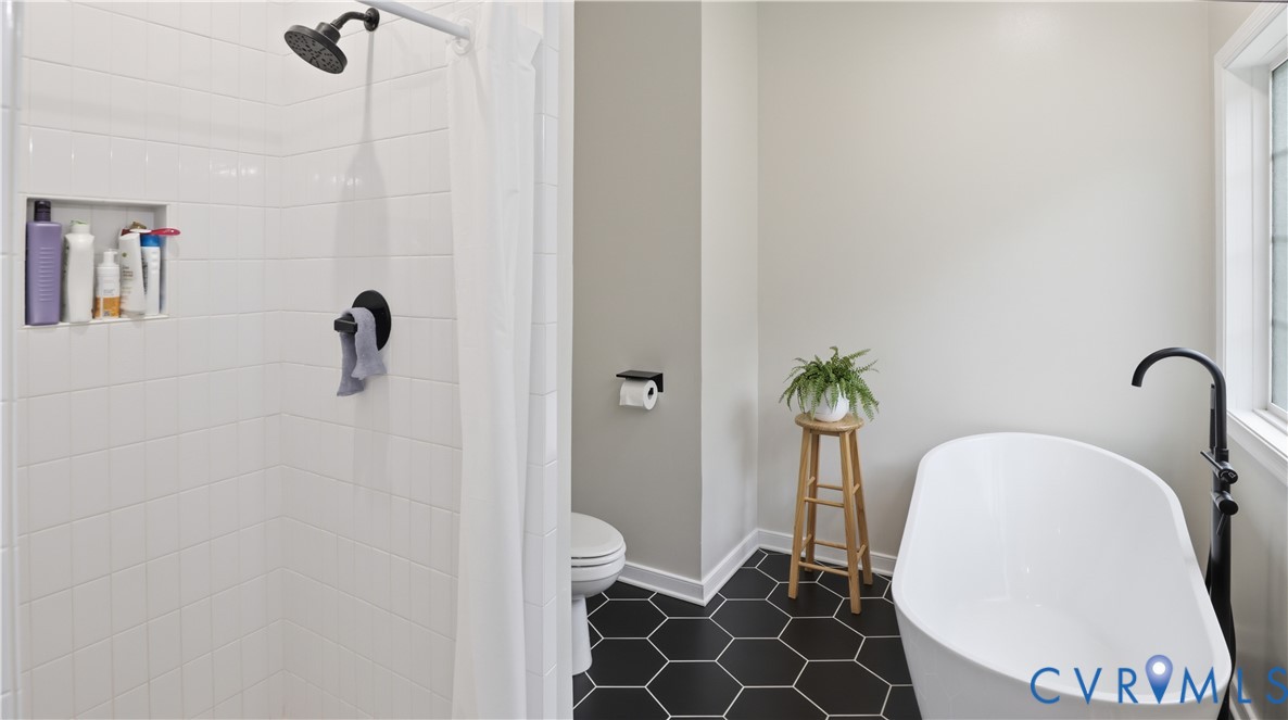 2406 Emanuel Church Road Powhatan, VA 23139 - Photo 28 of 48 Bathroom featuring a freestanding soaking tub, bla