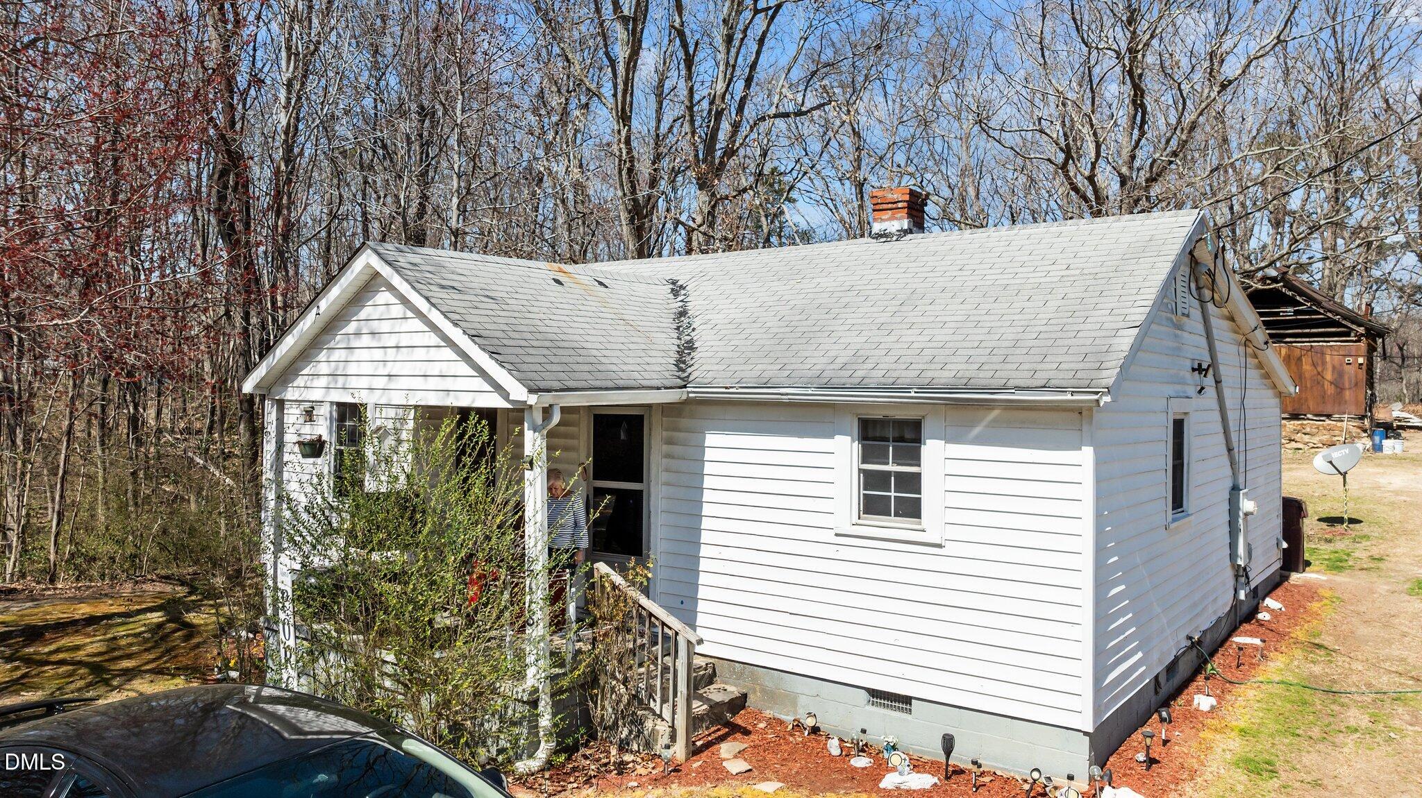 2710 Morton-Pulliam Road Roxboro, NC 27574 - Photo 6 of 13 a view of house with tree s