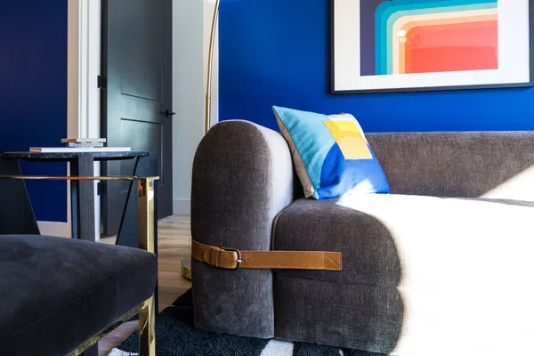 a bed room with a bed and a couch