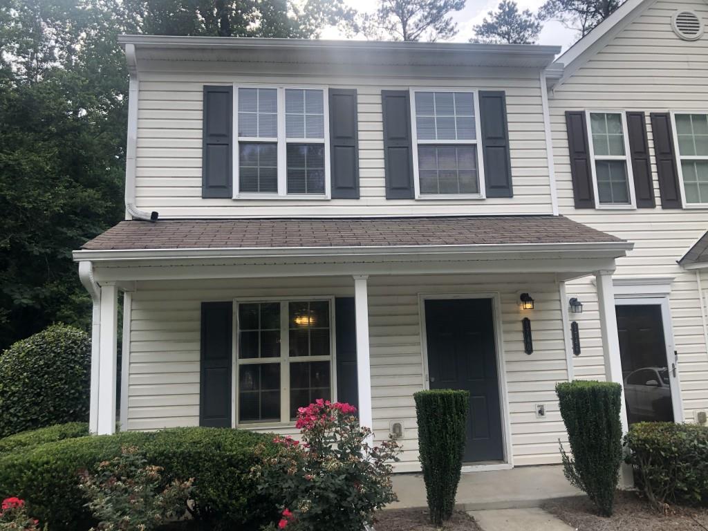1740 Devon Drive Atlanta, GA 30311 - Photo 1 of 1 a front view of a house with garden