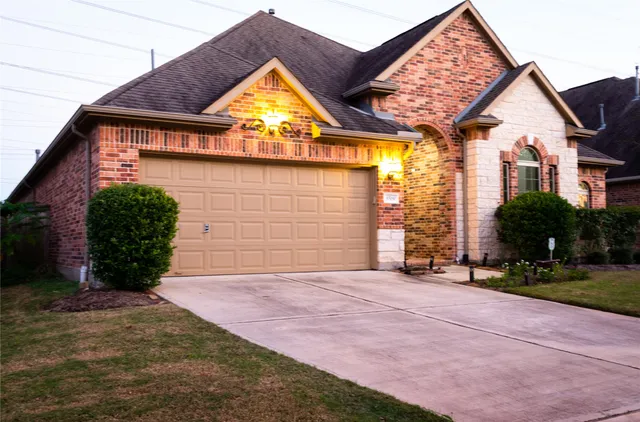a view of outdoor space and front view of a house