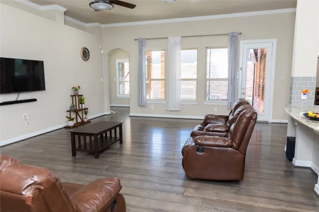 a kitchen with stainless steel appliances granite countertop a stove and a refrigerator