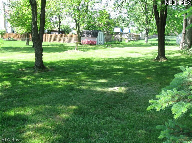 8908 Shepard Road Macedonia, OH 44056 - Photo 25 of 25 Beautiful yard; storage shed in distance.