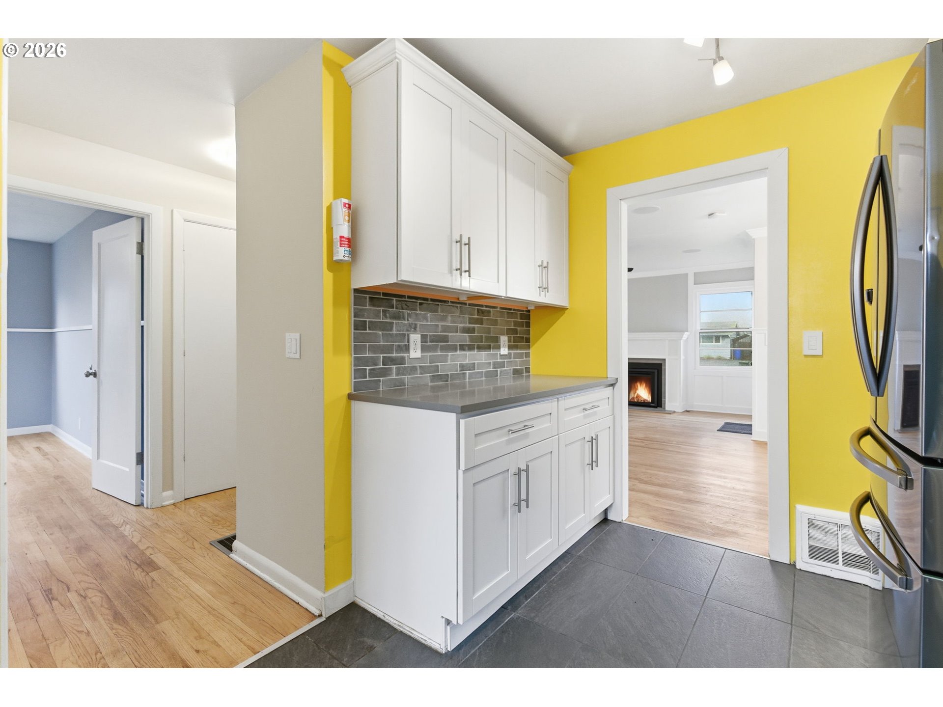 19 Northeast 139th Avenue Portland, OR 97230 - Photo 12 of 48 a kitchen with stainless steel appliances granite countertop a stove a sink and a refrigerator