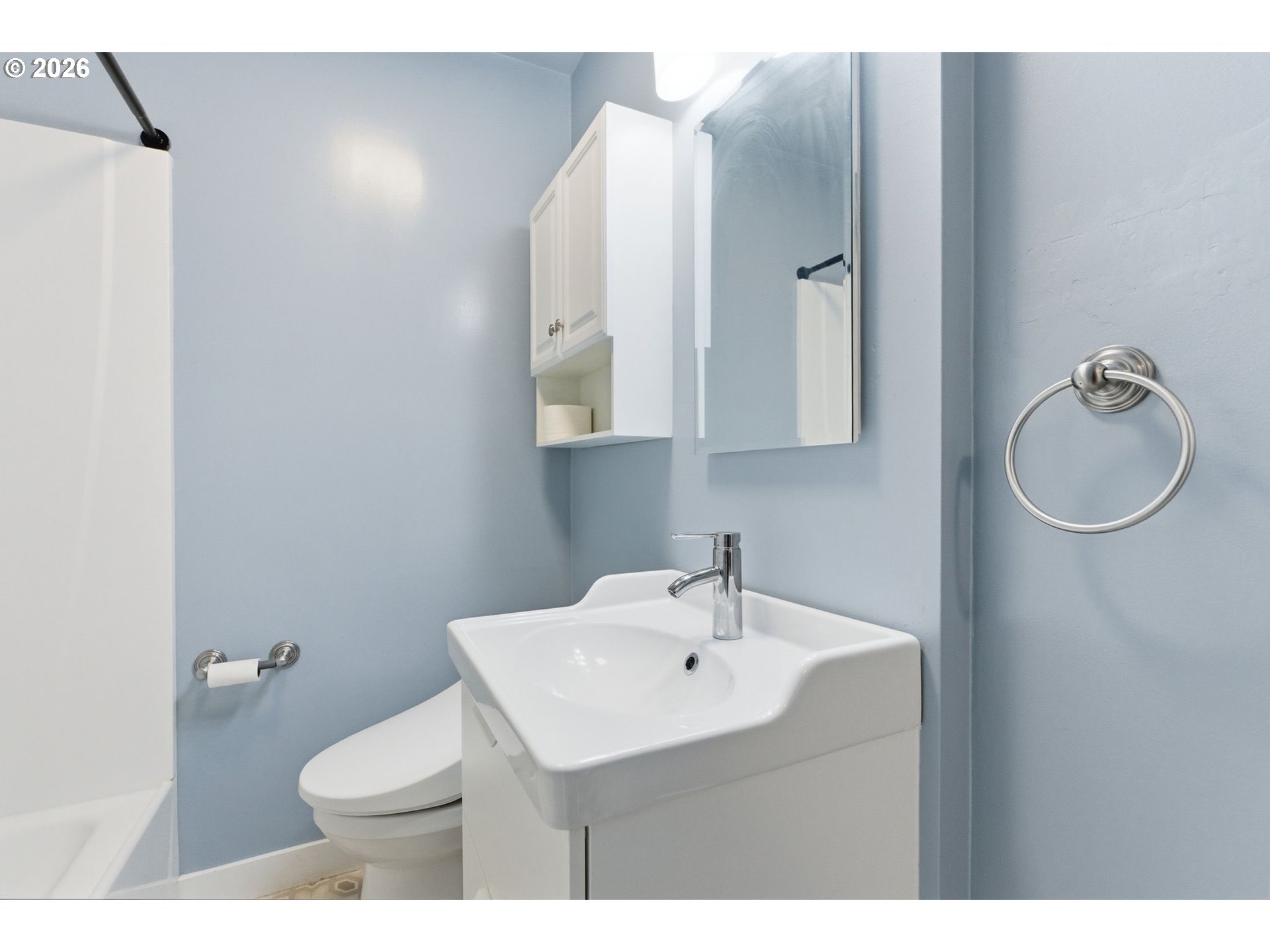 19 Northeast 139th Avenue Portland, OR 97230 - Photo 21 of 48 a bathroom with a sink a toilet and mirror