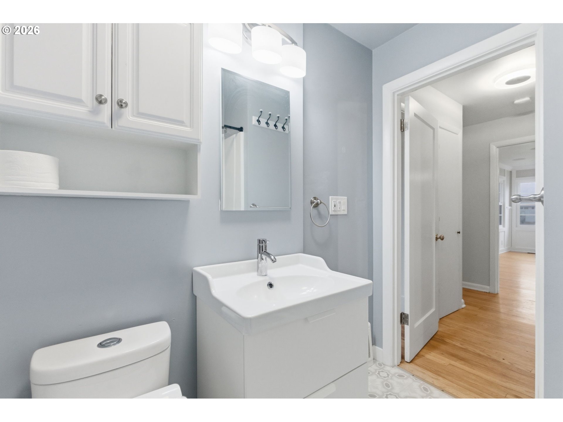 19 Northeast 139th Avenue Portland, OR 97230 - Photo 23 of 48 a bathroom with a sink a toilet and shower