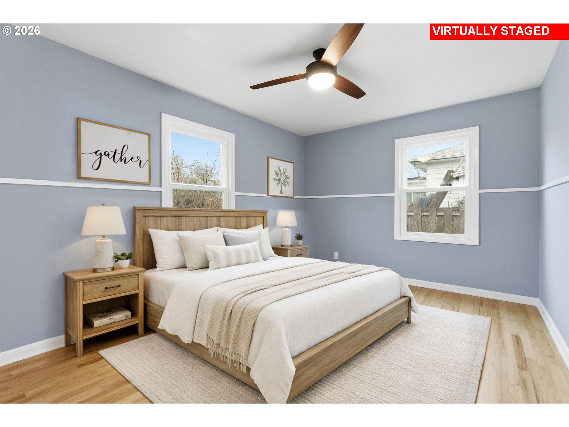 19 Northeast 139th Avenue Portland, OR 97230 - Photo 24 of 48 a bedroom with a bed and a painting on the wall