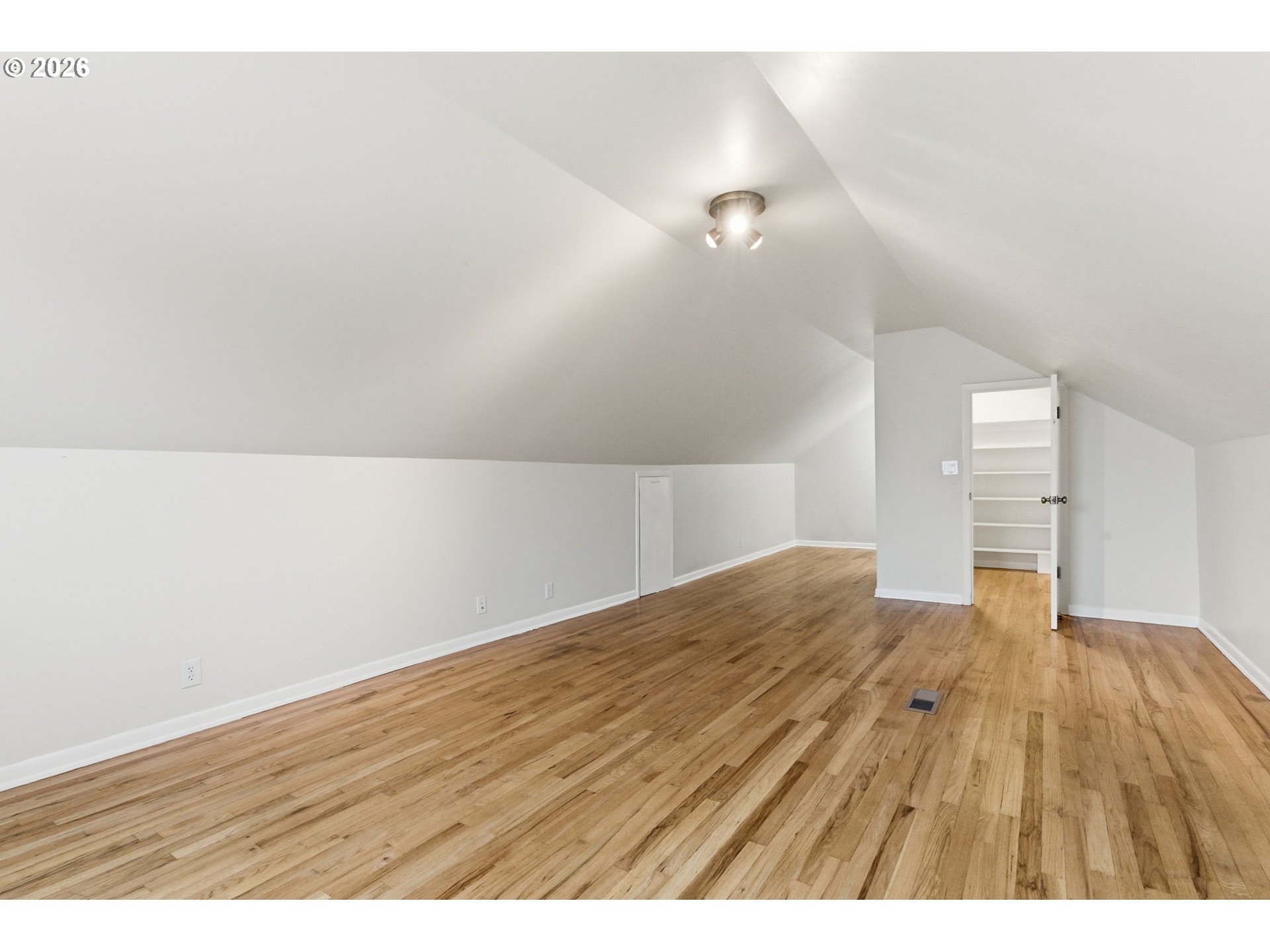 19 Northeast 139th Avenue Portland, OR 97230 - Photo 33 of 48 a view of an empty room and wooden floor