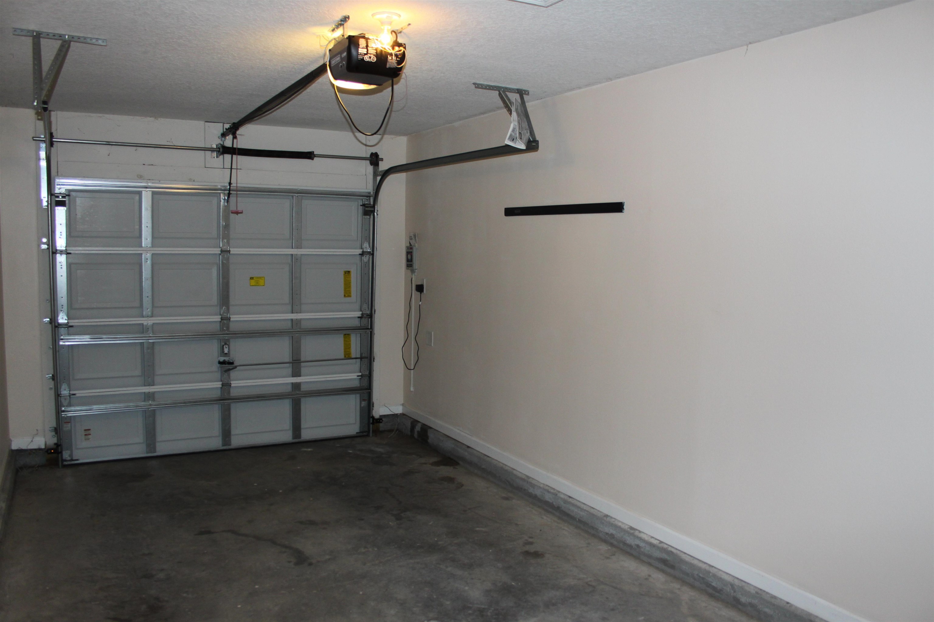 137 Buck Run Way St. Augustine, FL 32092 - Photo 12 of 21 a view of a room with racks on the wall