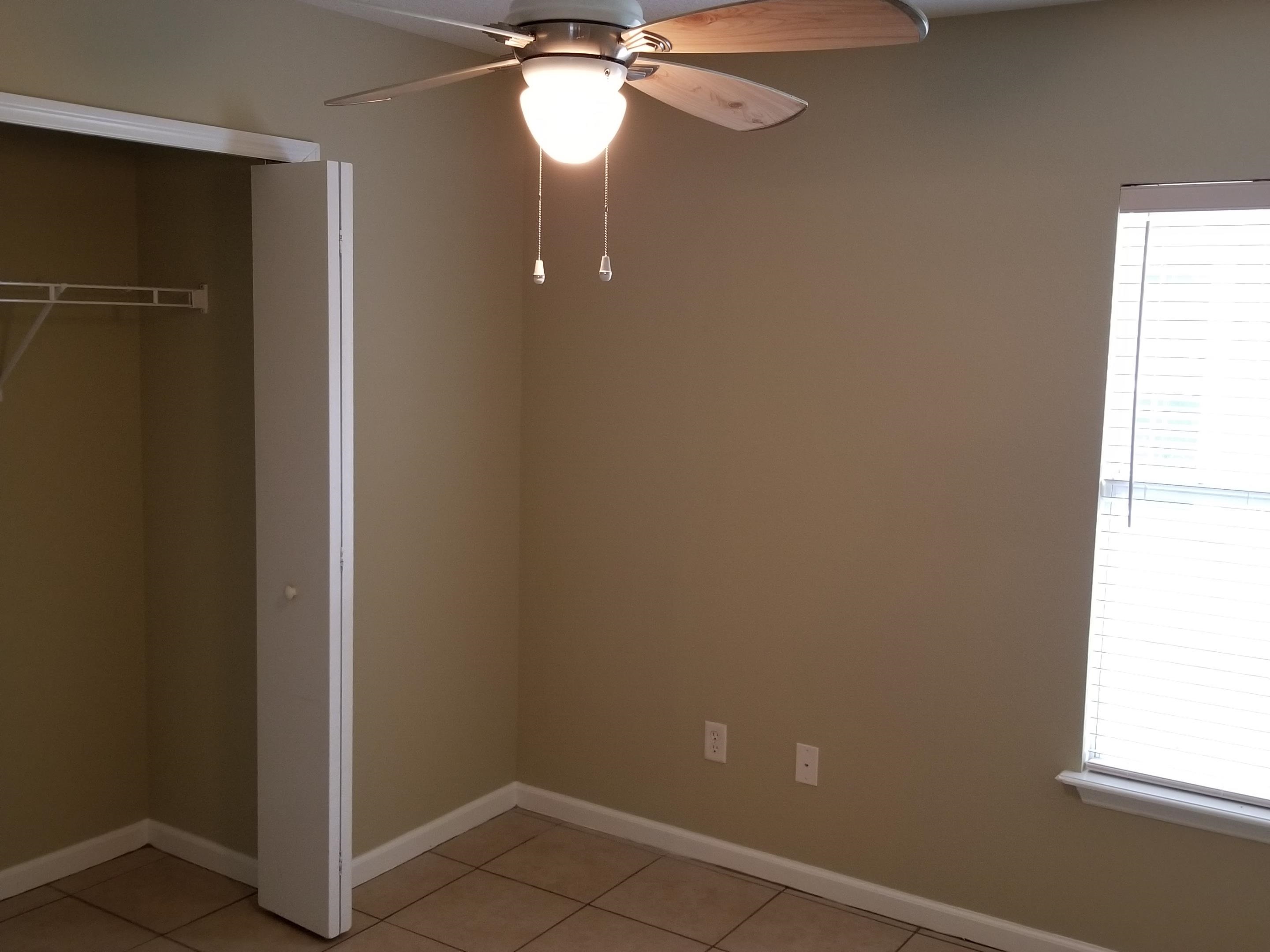 137 Buck Run Way St. Augustine, FL 32092 - Photo 9 of 21 an empty room with a window