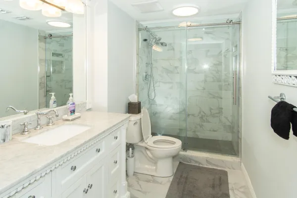 a bedroom with a bed and a closet