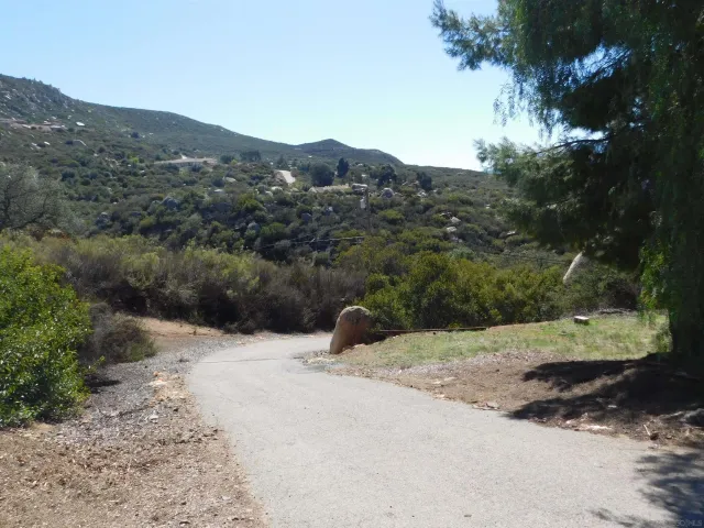 a view of a house in a field