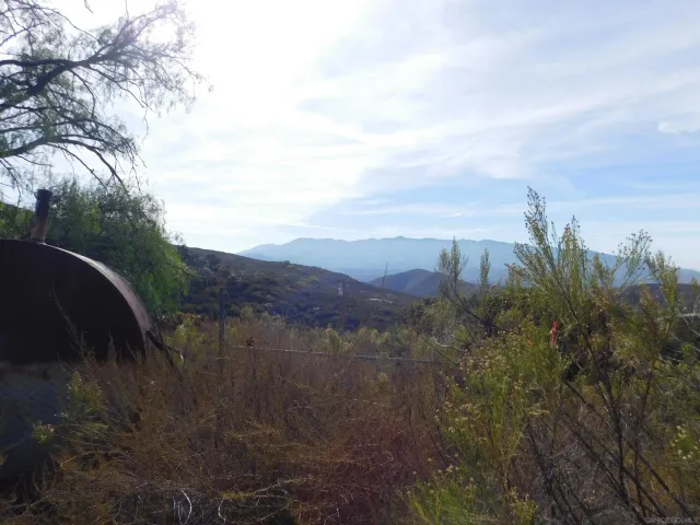 a view of a lake with mountain in the back