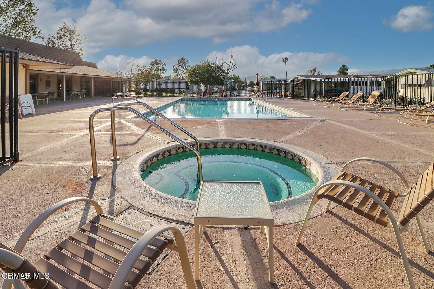 15750 Arroyo Drive, Unit 80 Moorpark, CA 93021 - Photo 16 of 19 an aerial view of a house with swimming pool