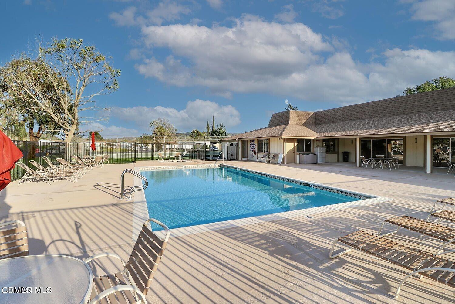 15750 Arroyo Drive, Unit 80 Moorpark, CA 93021 - Photo 17 of 19 a view of a house with swimming pool