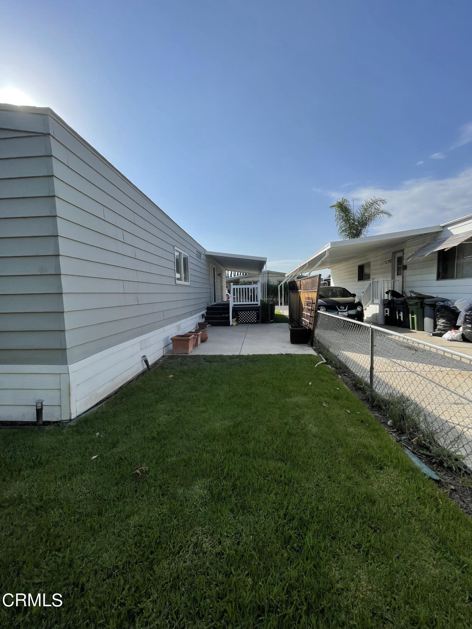 15750 Arroyo Drive, Unit 80 Moorpark, CA 93021 - Photo 3 of 19 a view of a backyard with furniture