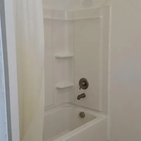 a bathroom with a bathtub