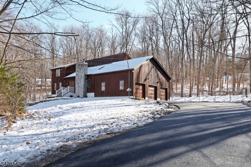 a view of house with a street