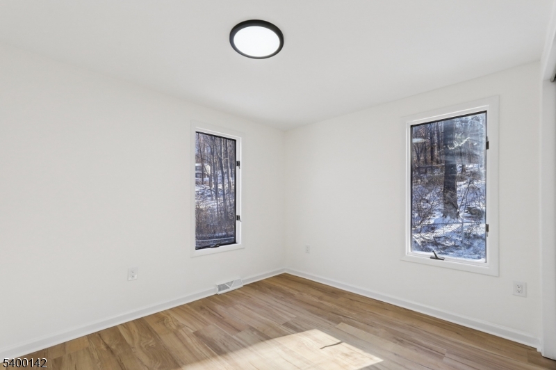 6 Maple Drive Vernon, NJ 07461 - Photo 15 of 47 an empty room with a window