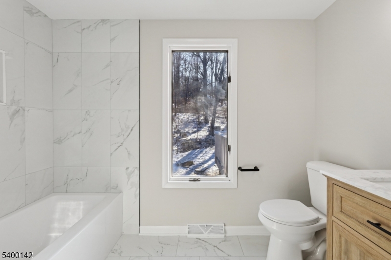 6 Maple Drive Vernon, NJ 07461 - Photo 17 of 47 a bathroom with a bathtub and a toilet