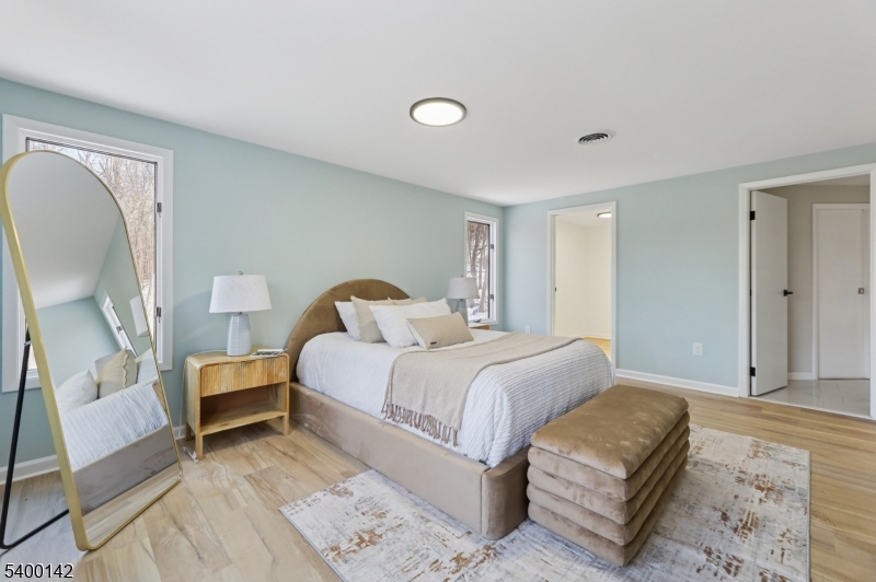 6 Maple Drive Vernon, NJ 07461 - Photo 32 of 47 a bedroom with a bed and a couch