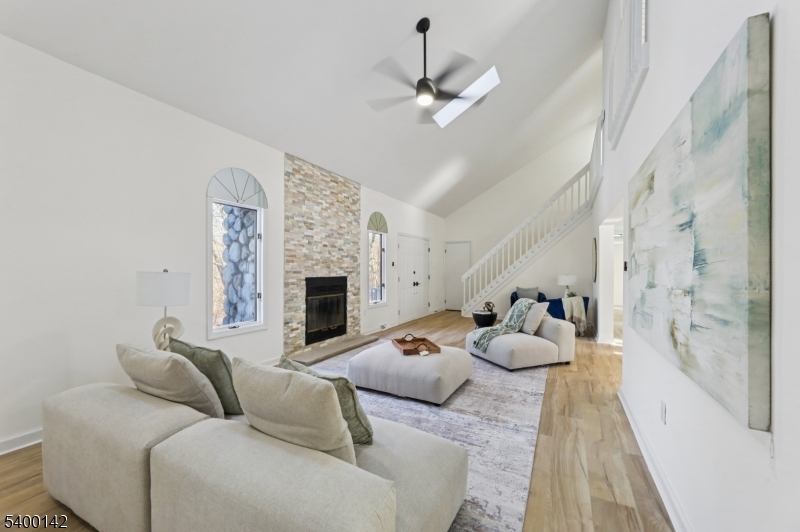 6 Maple Drive Vernon, NJ 07461 - Photo 7 of 47 a living room with furniture and a fireplace
