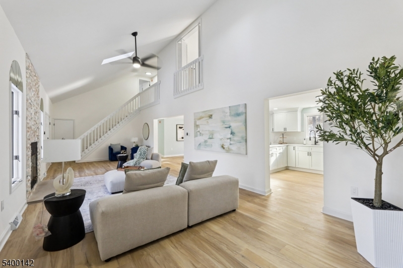 6 Maple Drive Vernon, NJ 07461 - Photo 8 of 47 a living room with furniture and a potted plant