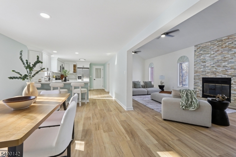 6 Maple Drive Vernon, NJ 07461 - Photo 9 of 47 a living room with furniture and a fireplace