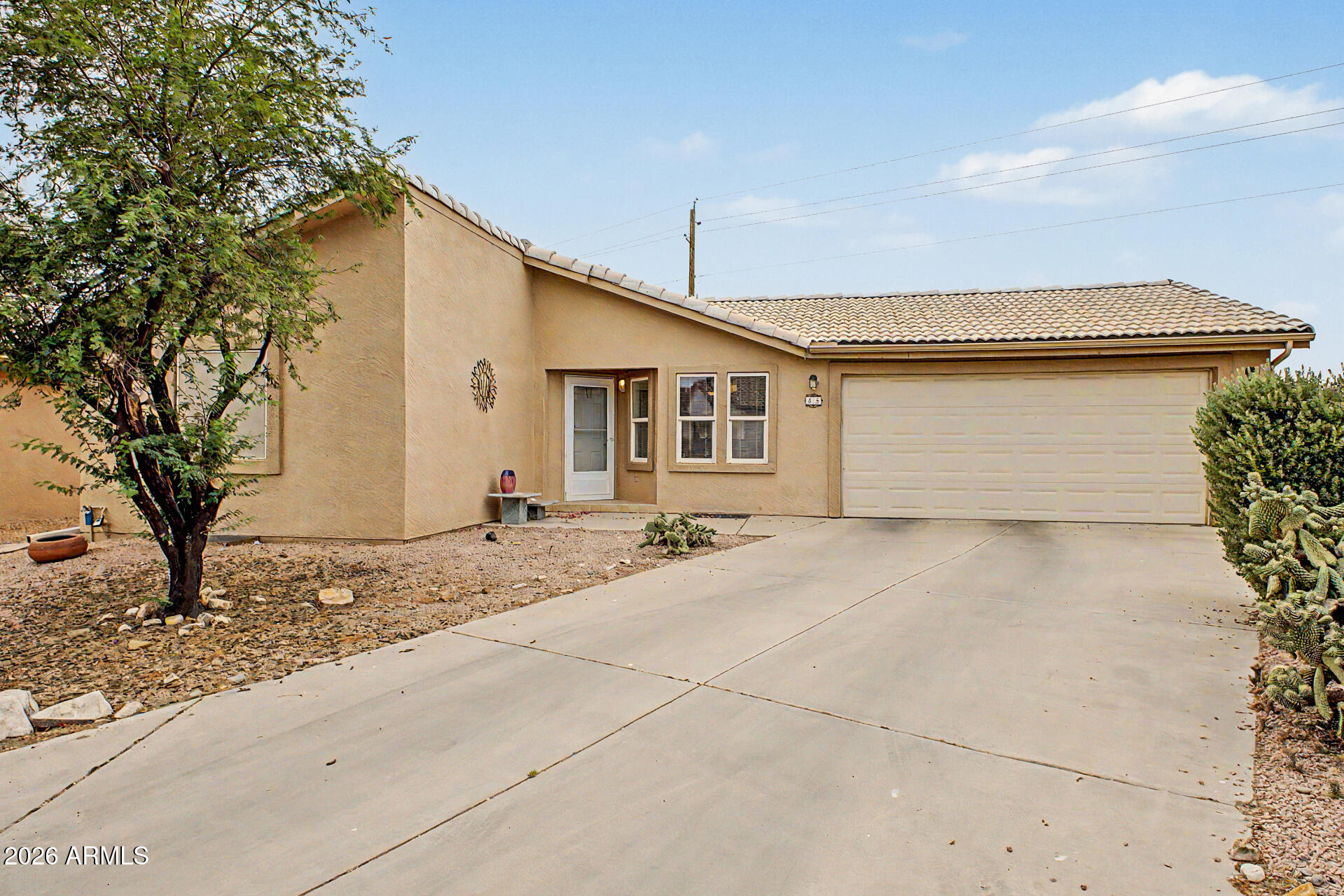 2101 South Meridian Road, Unit 45 Apache Junction, AZ 85120 - Photo 3 of 36 a view of a house with a patio