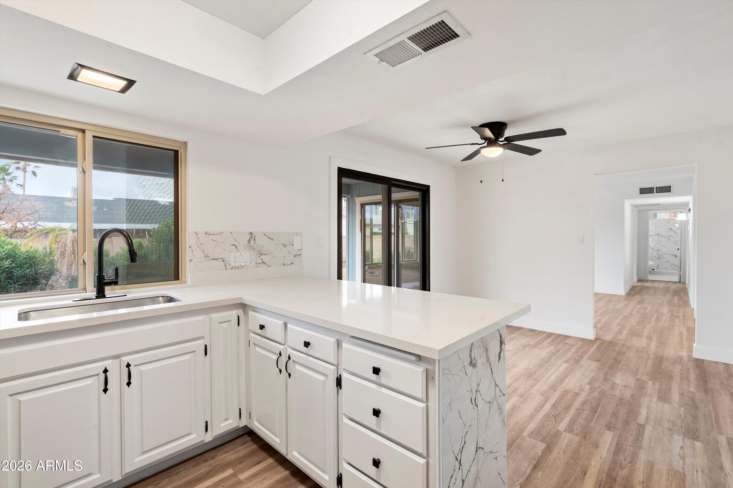 4829 East Apache Circle Phoenix, AZ 85044 - Photo 13 of 20 10-Kitchen to Dining