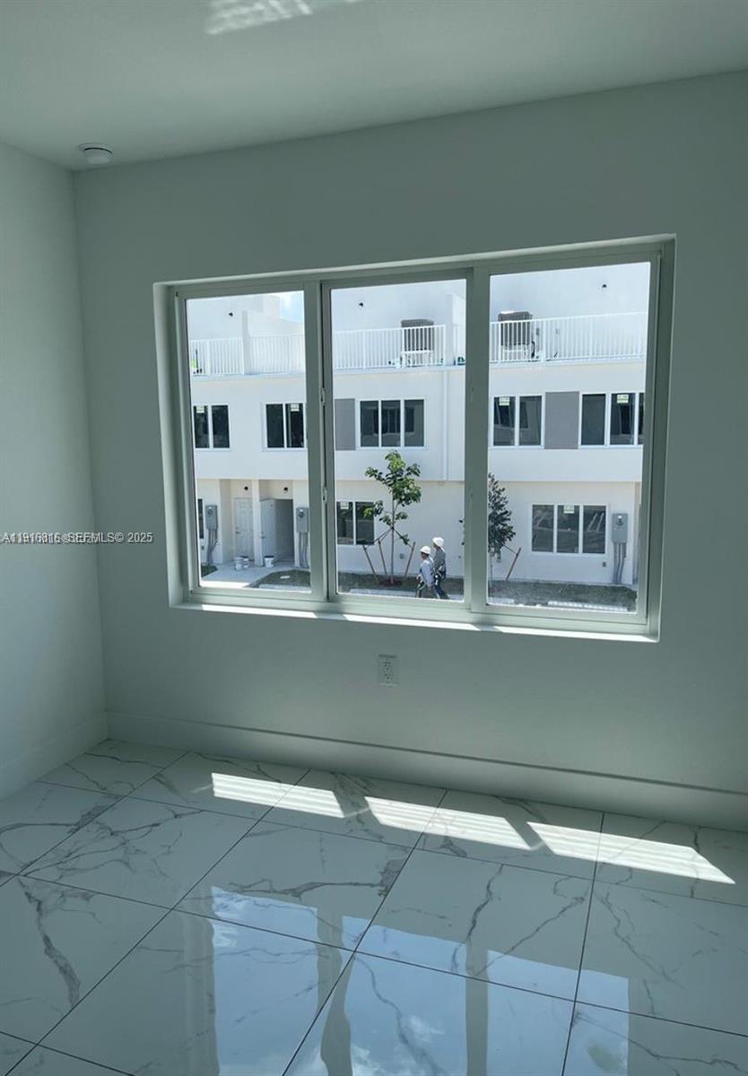 25842 Southwest 144th Avenue, Unit 25842 Homestead, FL 33032 - Photo 12 of 16 a view of front door