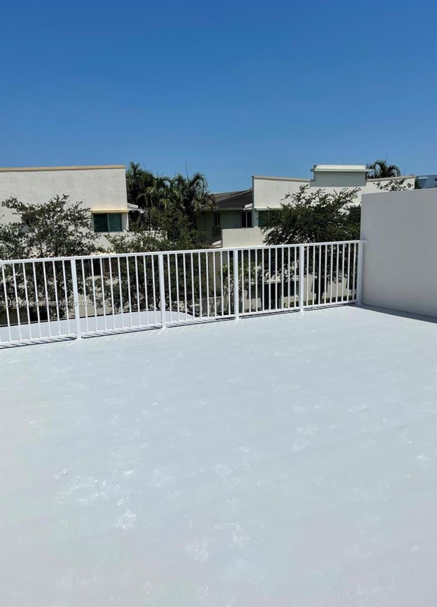 25842 Southwest 144th Avenue, Unit 25842 Homestead, FL 33032 - Photo 14 of 16 a view of balcony with city view