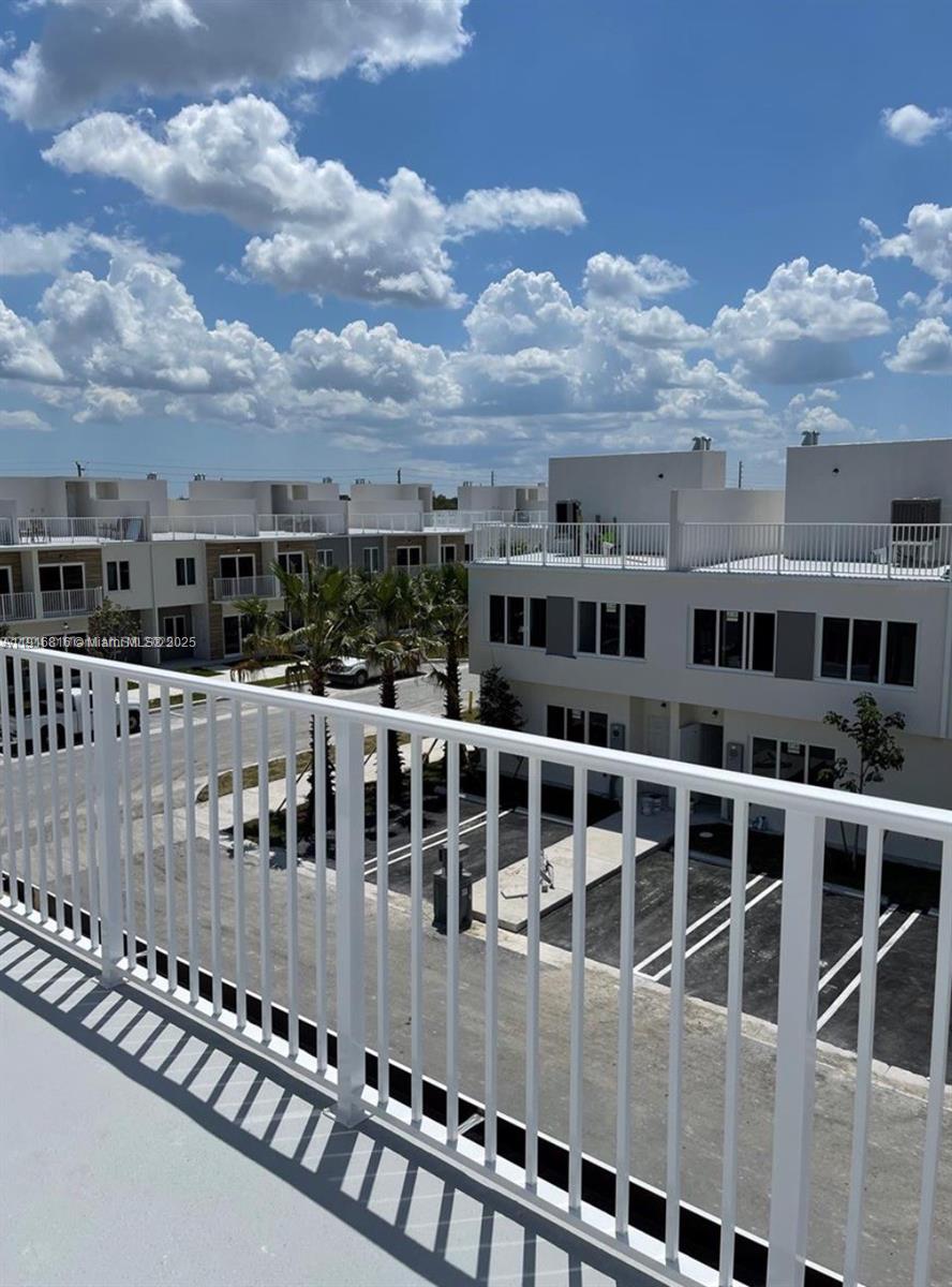 25842 Southwest 144th Avenue, Unit 25842 Homestead, FL 33032 - Photo 15 of 16 a view of a large building
