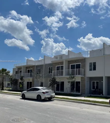 a car parked in front of a building