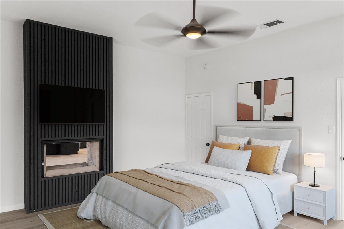 13816 Lakeview Drive Austin, TX 78732 - Photo 12 of 36 *Virtually Staged* The fireplace shares with the primary suite.