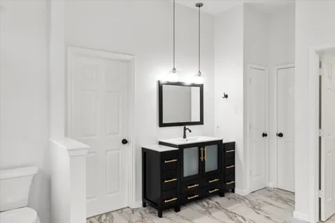 a view of bathroom with dual sinks