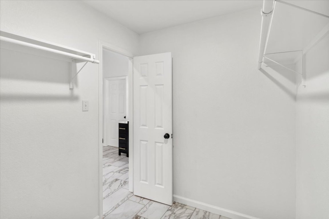 13816 Lakeview Drive Austin, TX 78732 - Photo 19 of 36 The primary offers a large walk-in closet.