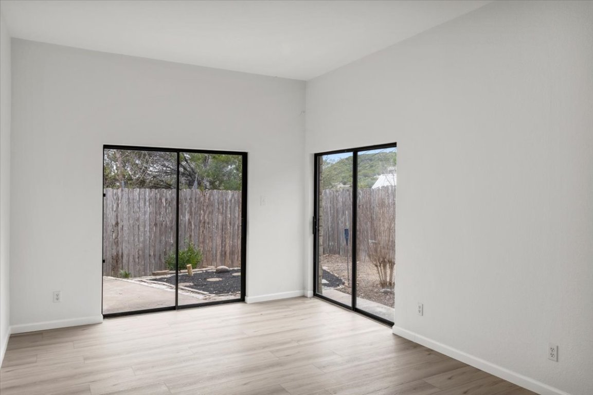 13816 Lakeview Drive Austin, TX 78732 - Photo 21 of 36 Bedroom 2 also offers outdoor access.