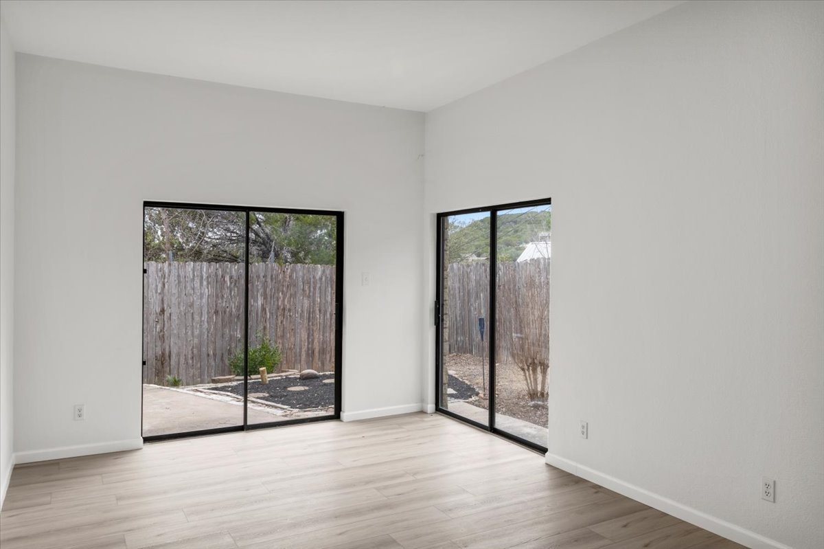 13816 Lakeview Drive Austin, TX 78732 - Photo 21 of 36 Bedroom 2 also offers outdoor access. This is new additional space and is not accounted for in the square footage listed.