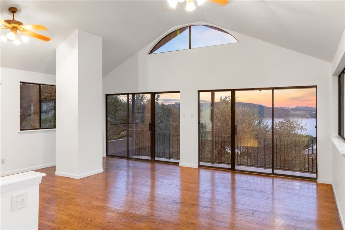 13816 Lakeview Drive Austin, TX 78732 - Photo 24 of 36 Expansive sliding doors and windows cover the top floor.