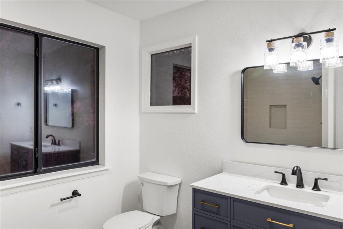 13816 Lakeview Drive Austin, TX 78732 - Photo 32 of 36 Updated fixtures throughout the home provide a high-end design.