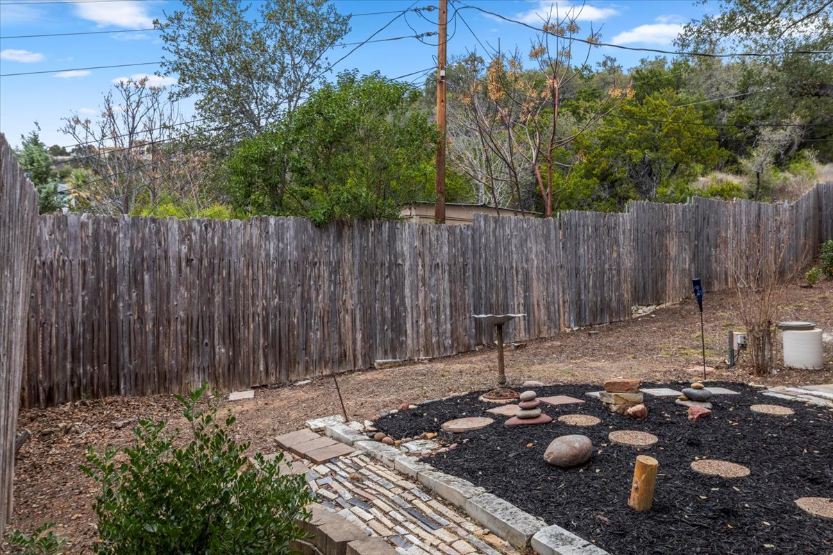 13816 Lakeview Drive Austin, TX 78732 - Photo 35 of 36 The private yard space offers a low maintenance design.