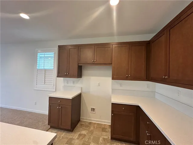 a bathroom with a sink shower and toilet
