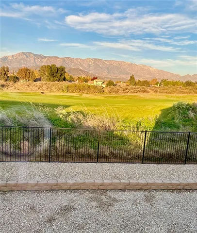 a view of a patio with swimming pool table and chairs