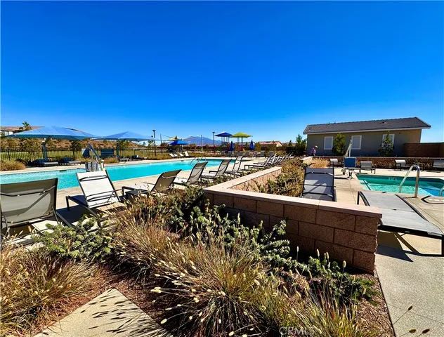 a view of a big room with kitchen a sink kitchen and window